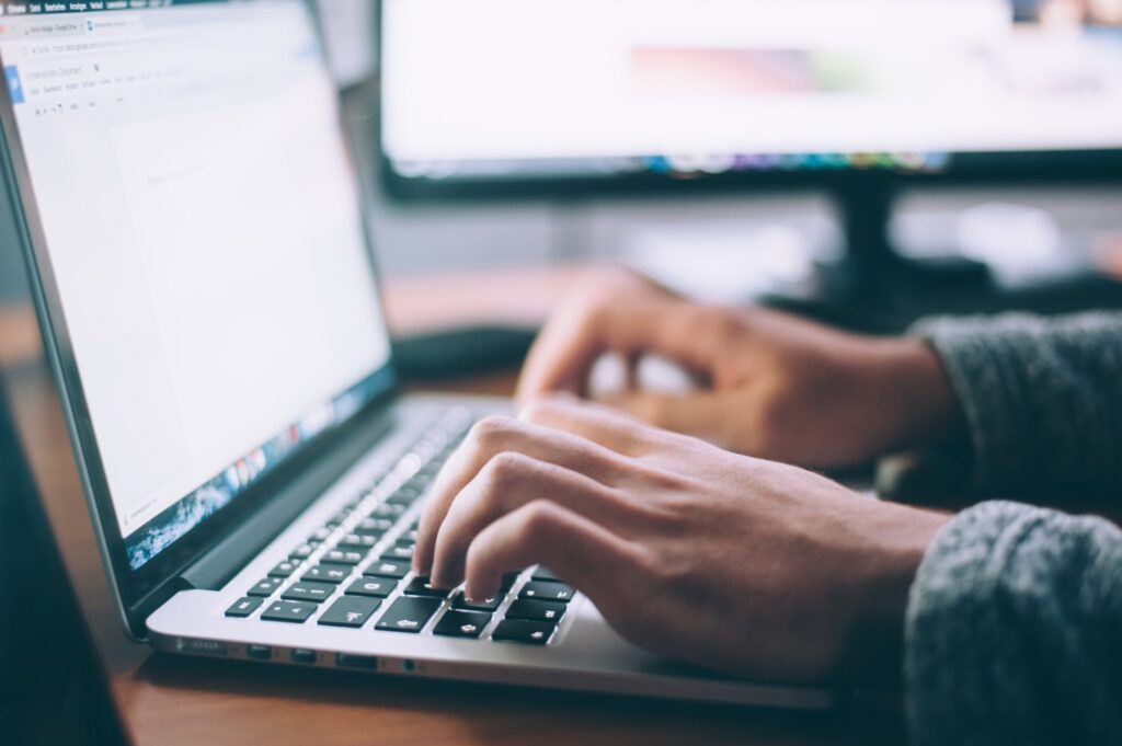 a person at a laptop completes an asset tracing search