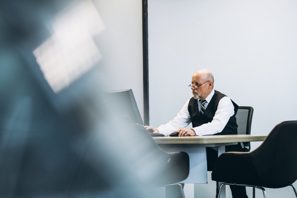 company directorship searching on the internet in his office.